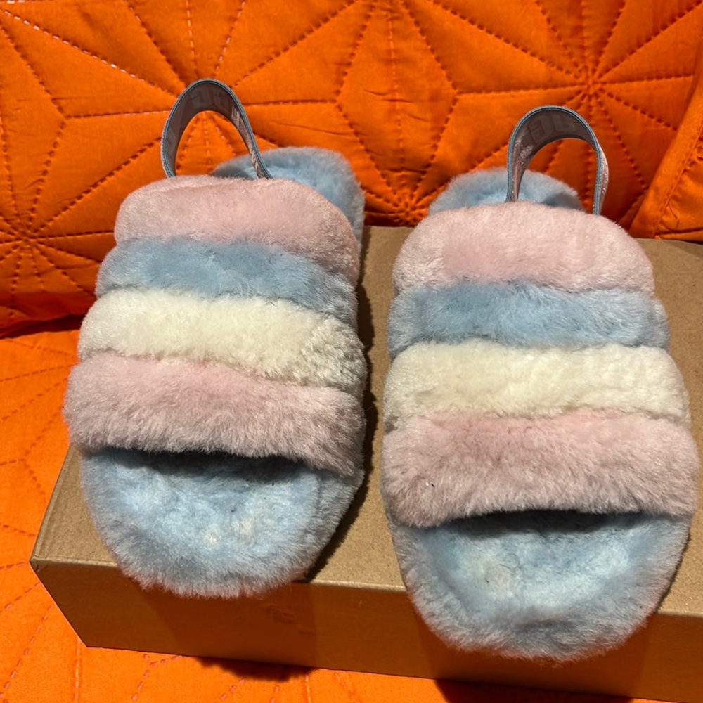 Furry UGG size 13. Like new only worn a few times. Really cute.